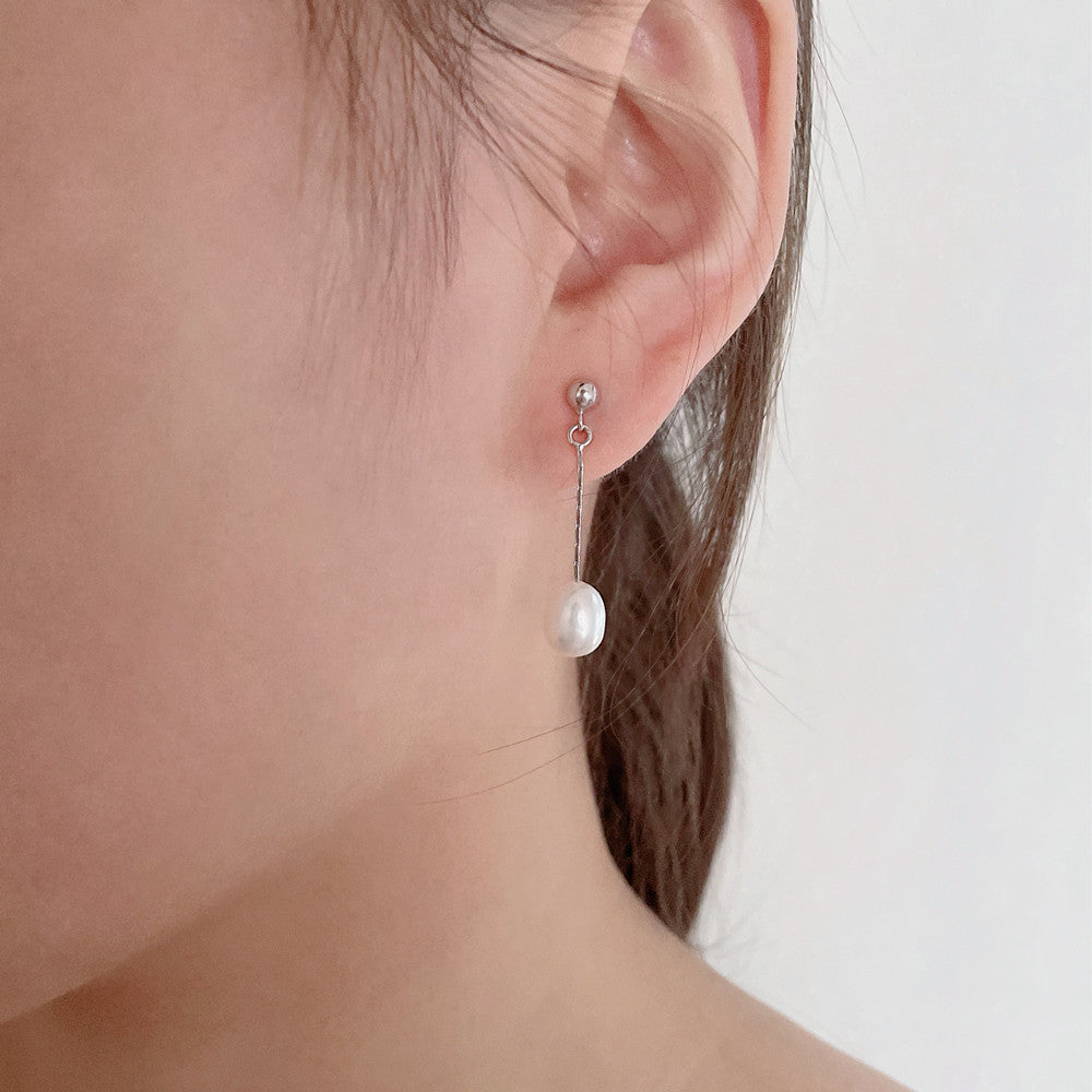 Oorbellen met elegante parel