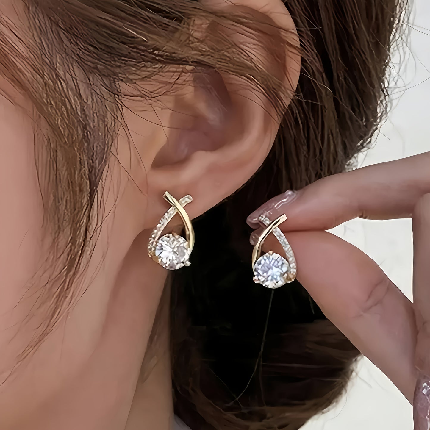 Oorbellen met gouden kruis en zirconia
