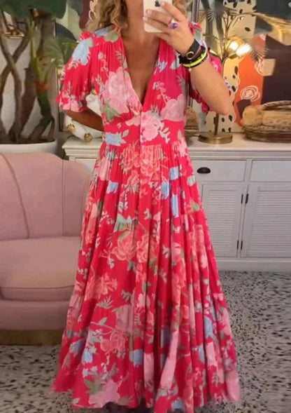 Loszittende lange jurk met V-hals en bloemenprint