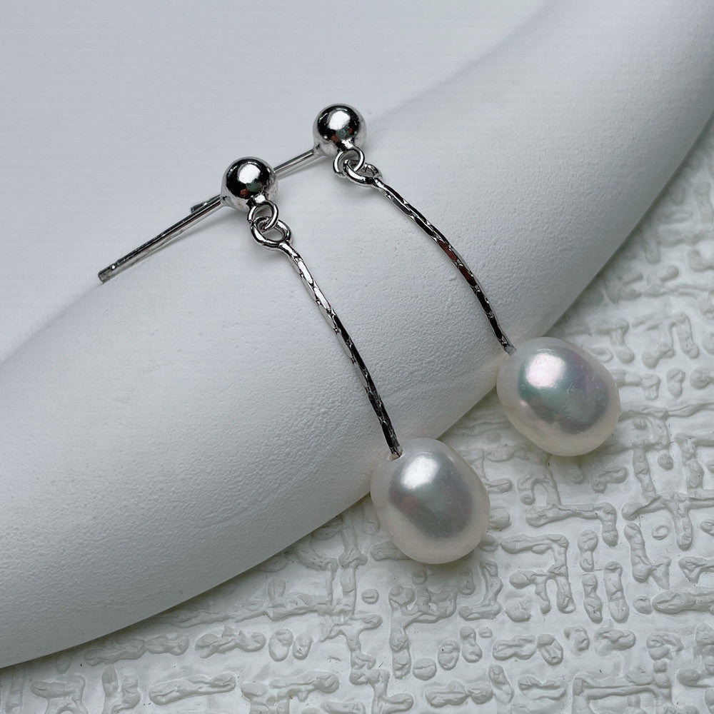 Oorbellen met elegante parel