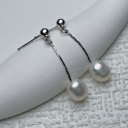 Oorbellen met elegante parel