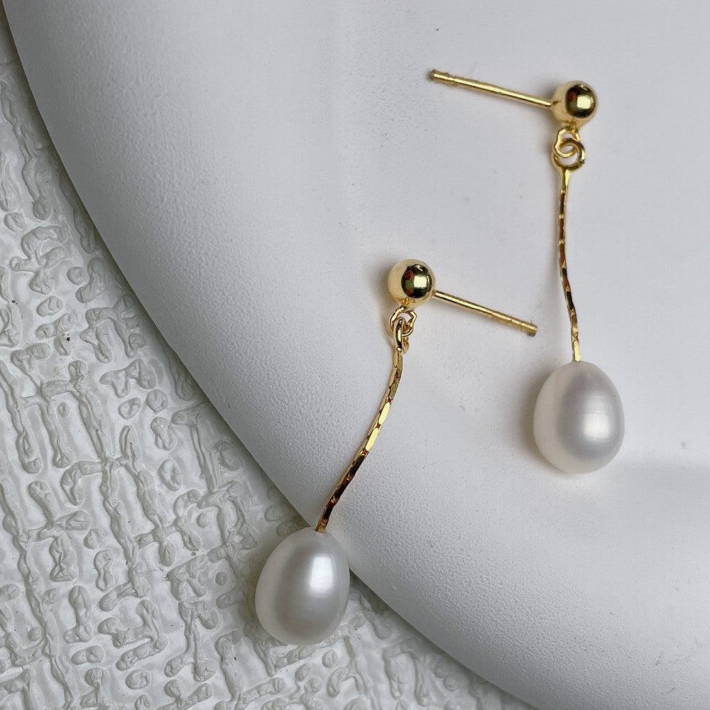 Oorbellen met elegante parel