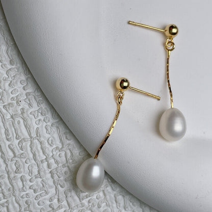 Oorbellen met elegante parel