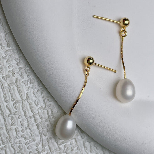 Oorbellen met elegante parel