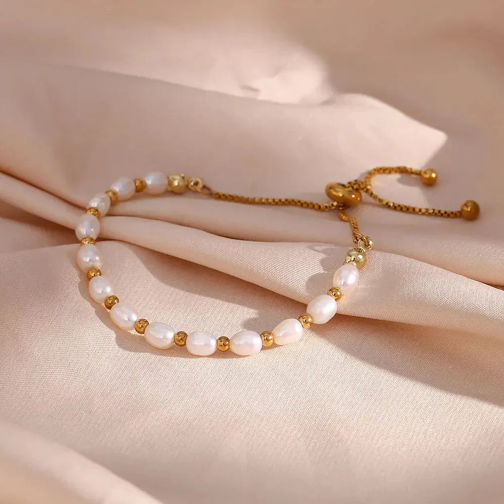 Elegante parel en gouden armband