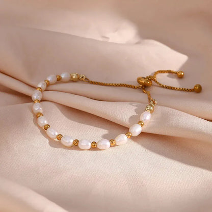 Elegante parel en gouden armband