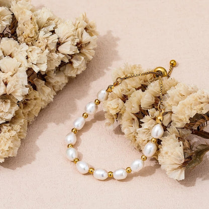 Elegante parel en gouden armband