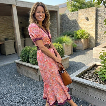 Elegante roze maxi-jurk met korte mouwen