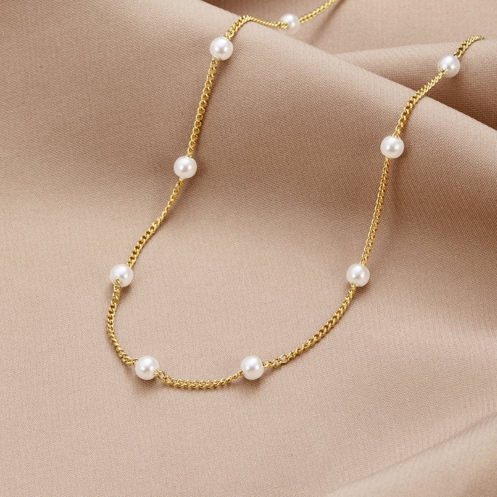 Tijdloze gouden ketting met pareloog