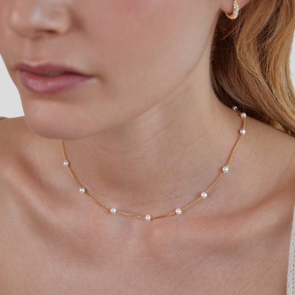 Tijdloze gouden ketting met pareloog