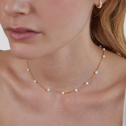 Tijdloze gouden ketting met pareloog