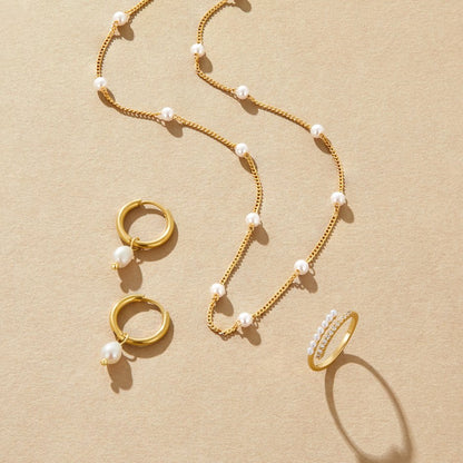 Tijdloze gouden ketting met pareloog